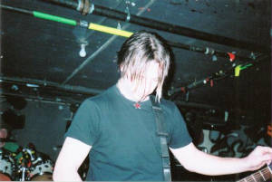 jasonfixingguitar.jpg